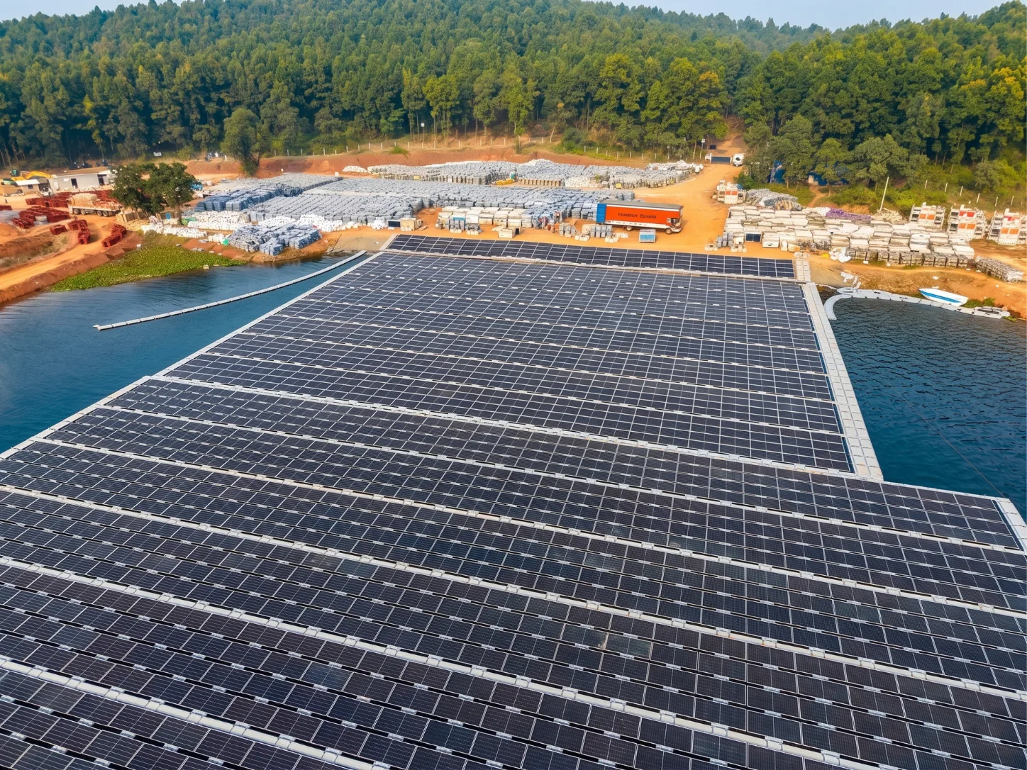 Grid evacuation infrastructure carrying power from a floating solar array toward the shore